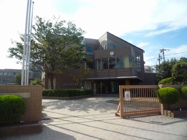 井田中学校　(知・徳・体の調和のとれた人間性豊かな、しなやかで　たくましい人を育成する。)